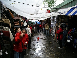Cajoling merchants on my trip to China 2003
